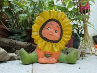 Niño Girasol para jardín (barnizado para lluvia) $40